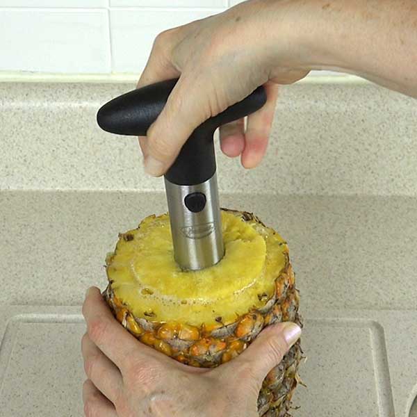 Stop turning corer when nearing bottom of pineapple