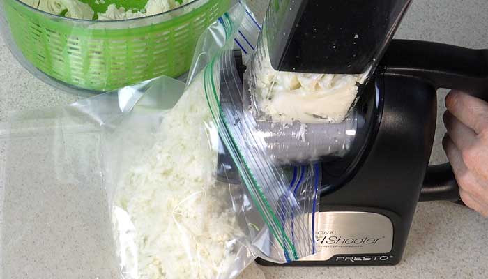 Presto Professional Salad Shooter Shooting Cauliflower Rice into a Freezer Bag